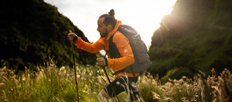 man hiking in bever outfit